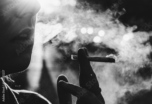 Woman Smoking A Marijuana Joint