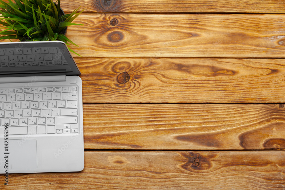 Laptop, notebook on work wooden desk Laptop, notebook on work wooden desk