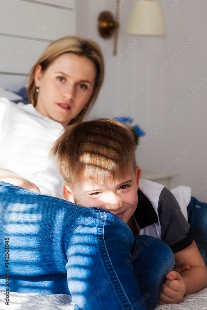 Portrait of mother and son in the room Portrait of mother and son in the room