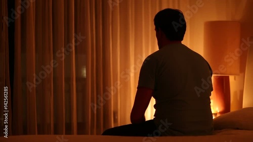 Lonely Man By The Bed Side Person By Bed Side Preparing To Go To Sleep Man Breathing Deeply Before Going To Bed photo