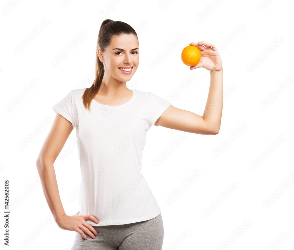 Beautiful woman holding an orange isolated on white background Beautiful woman holding an orange isolated on white background