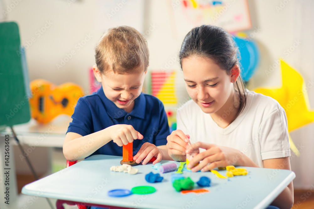 Kids Play Modeling Plasticine in the living room Kids Play Modeling Plasticine in the living room