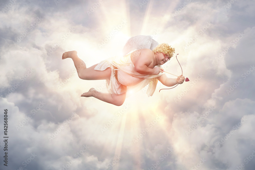 Funny overweight cupid aiming with the arrow of love with copy space