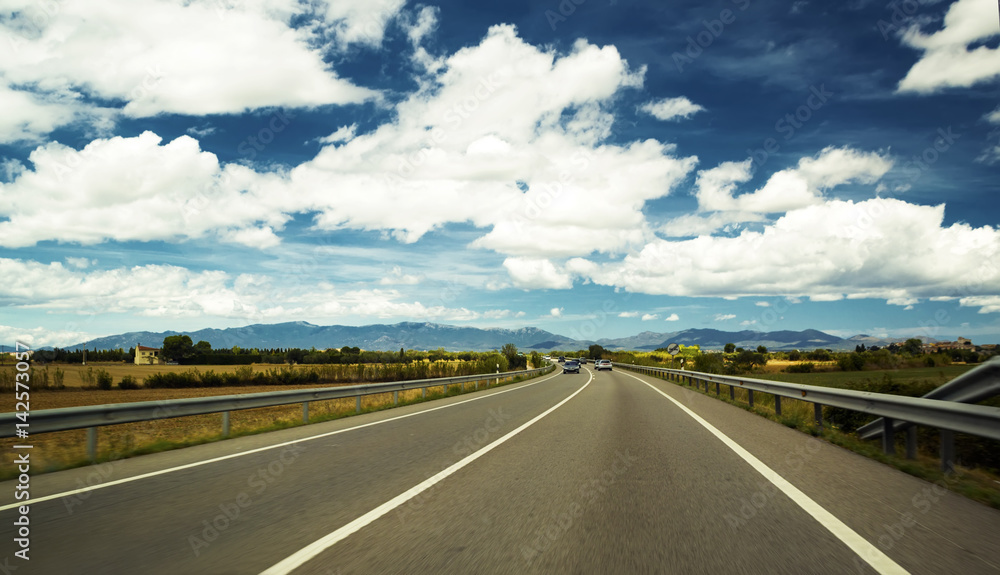 The road stretches into the distance. The road stretches into the distance.