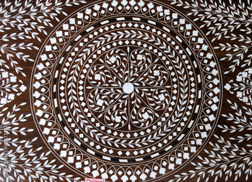 фотографія Indian marquetry panel with circular and floral pattern, part of a table, souven