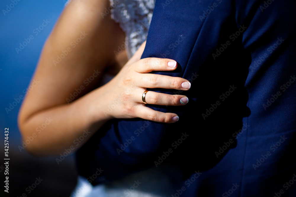 Hand of the bride with wedding ring, close-up