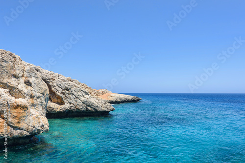 Pirate bay in protaras paralimni, immaculate water, blue sea and rocks, cyprus island © frimufilms