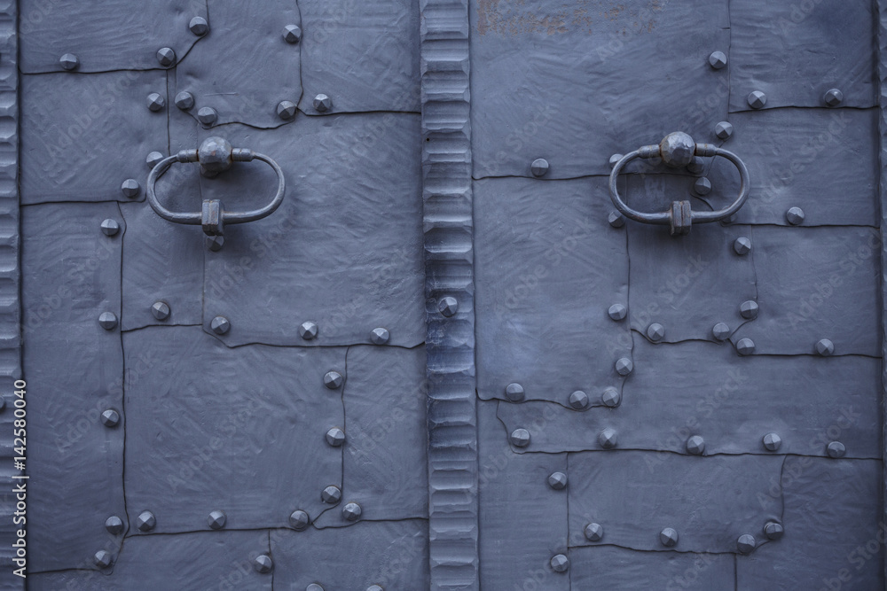 Ancient cast iron door with handle Architecture Ancient cast iron door with handle Architecture