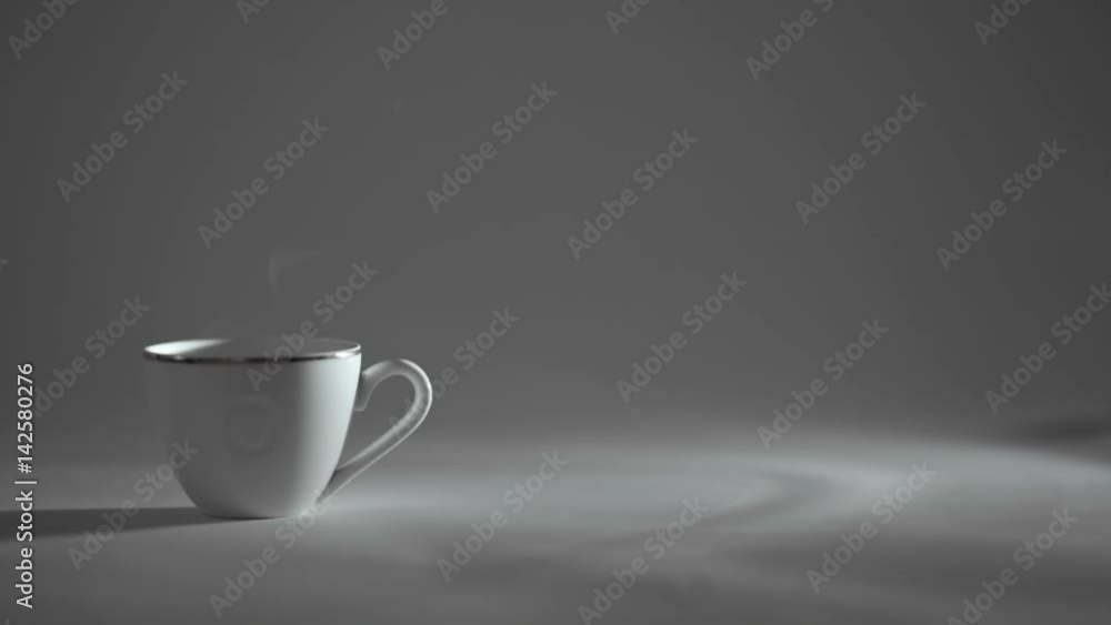 white Cup of hot tea or coffee, steam comes. white Cup of hot tea or coffee, steam comes.