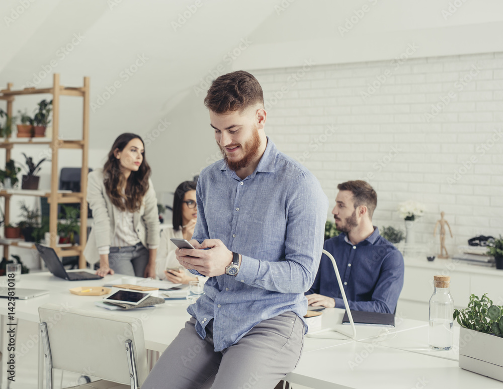 Obraz premium Businessman Using Phone