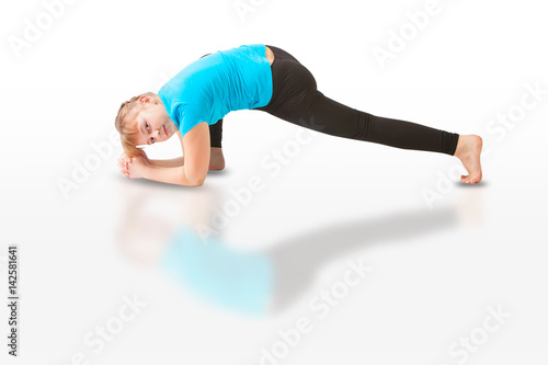 beautiful woman doing yoga on white background