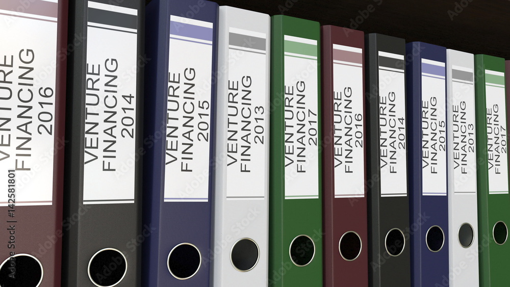 Line of multicolor office binders with Venture financing tags different years 3D rendering Line of multicolor office binders with Venture financing tags different years 3D rendering