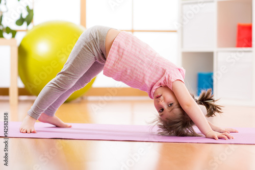 Child preschooler doing fit...