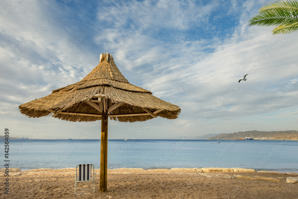 Morning at sandy beach in Eilat - famous resort in Israel