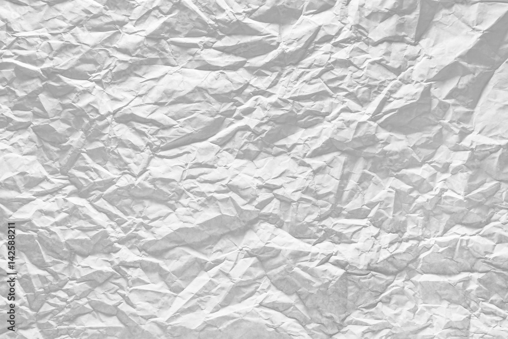 Surface of crumpled paper highlighted by light.
Stressed, illuminated sheet of paper paper. Surface of crumpled paper highlighted by light.
Stressed, illuminated sheet of paper paper.