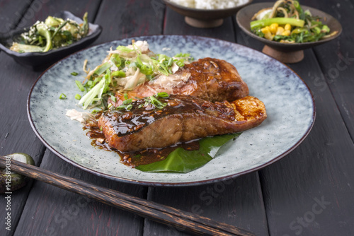 Traditional Japanese Salmon Teriyaki with Vegetable on a Plate