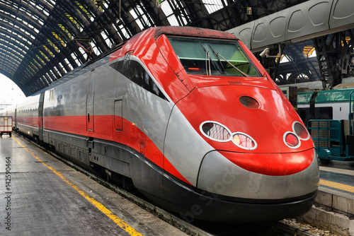 high-speed train at the railway station photo