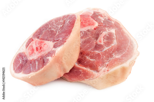 Slices of raw pork knuckle isolated