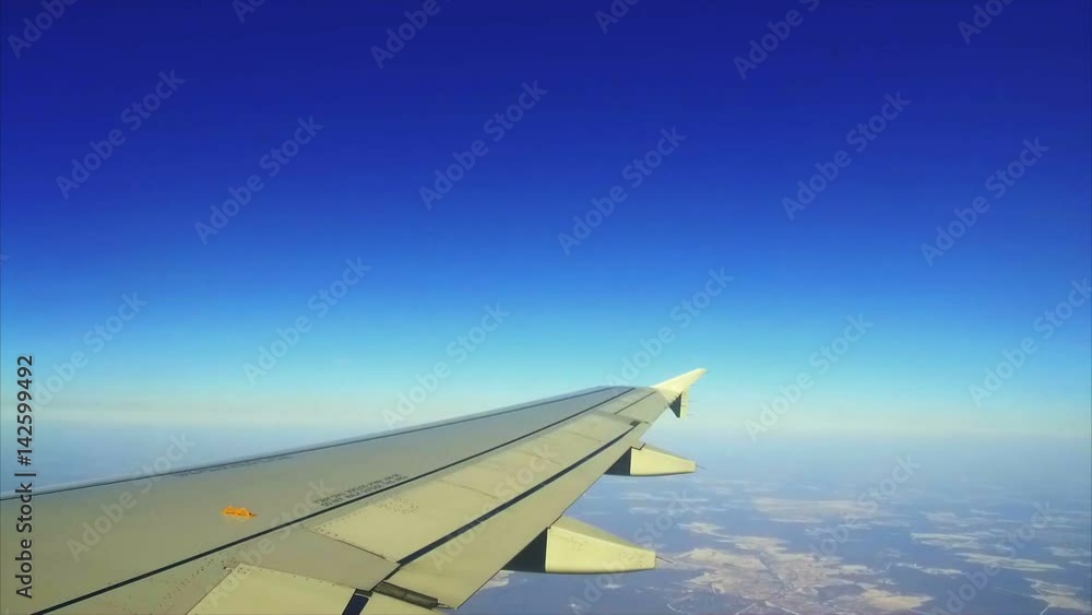 view of planet earth from an airplane through the window view of planet earth from an airplane through the window