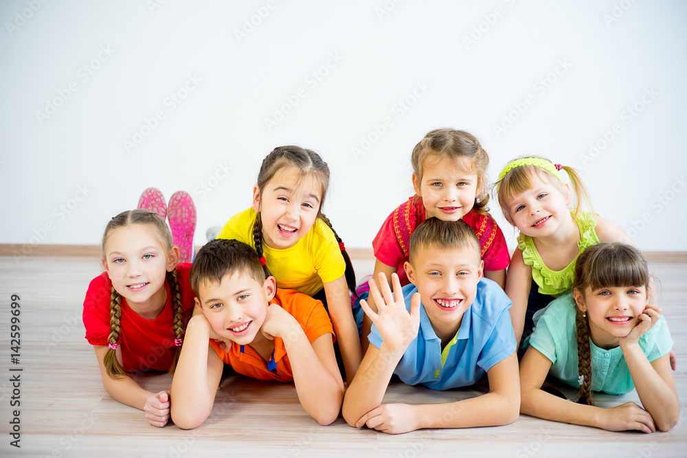 Kids lying on floor