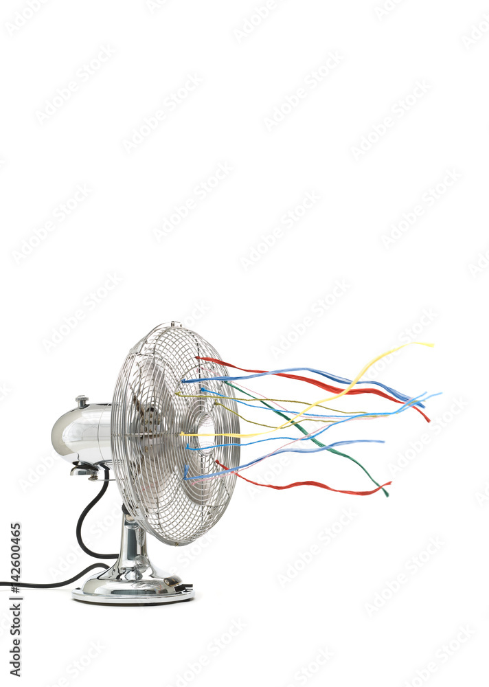 Fan with colored ribbons in front of white Fan with colored ribbons in front of white