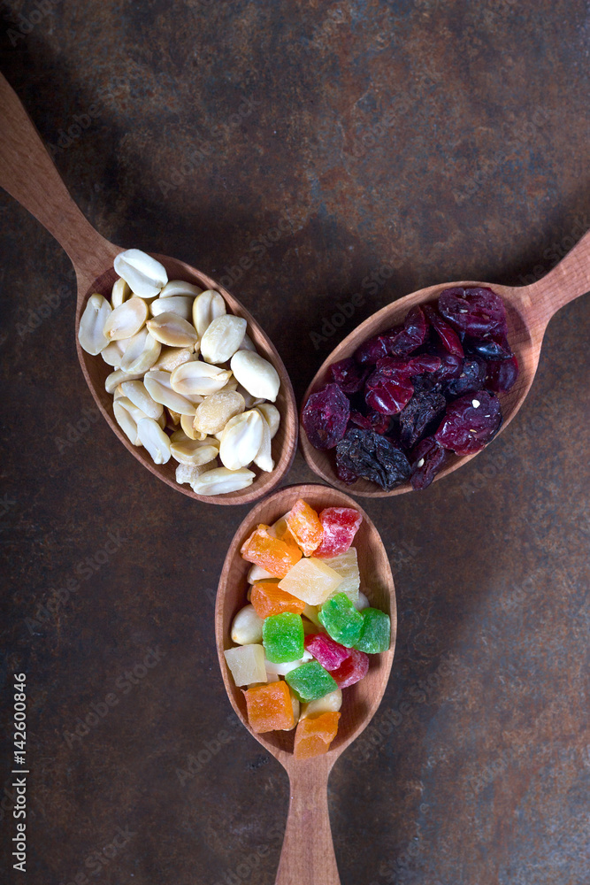 Peanuts, raisins and candied fruits - healthy breakfast Peanuts, raisins and candied fruits - healthy breakfast