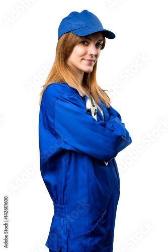 Delivery woman with her arms crossed