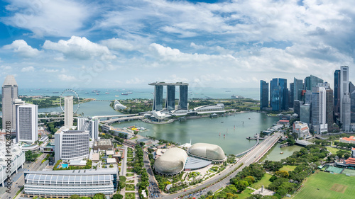 Photography Aerial view of Singapore business district and city at twilight in Singapore, Asia