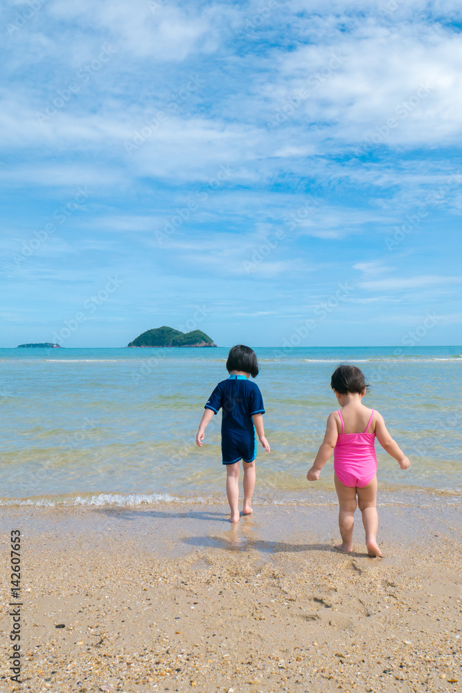 Children ran into the sea
