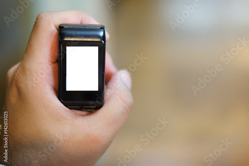 Smart Watch in young man hand