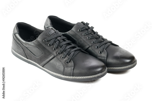 A pair of modern men's sport shoes in black.