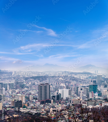 Seoul cityscape, skyline, high rise office buildings and skyscrapers in Seoul city, winter daylight, top view in winter, Seoul, Republic of Korea, in mist winter season