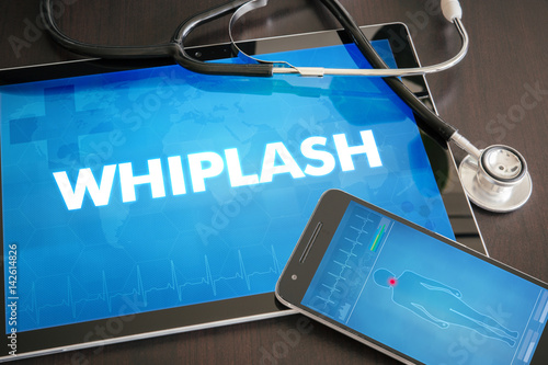 Фотография Whiplash (neurological disorder) diagnosis medical concept on tablet screen with