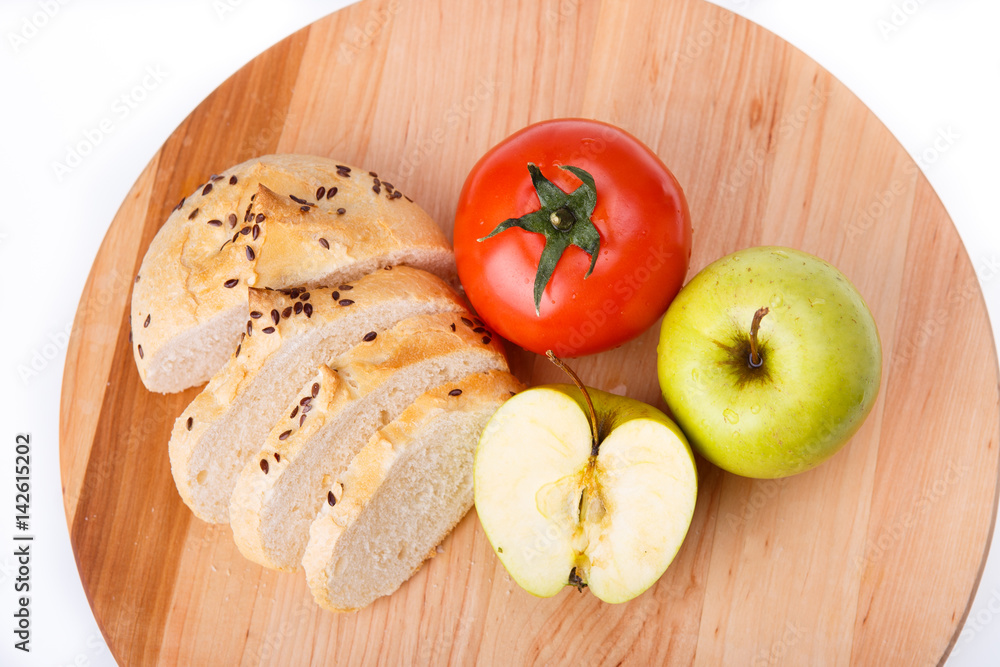 white bread with beans, tomato, Apple on a wooden tray white bread with beans, tomato, Apple on a wooden tray