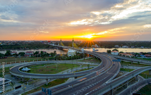 Nonthaburi bridge in Bangkok Thailand road for transportation and sunset