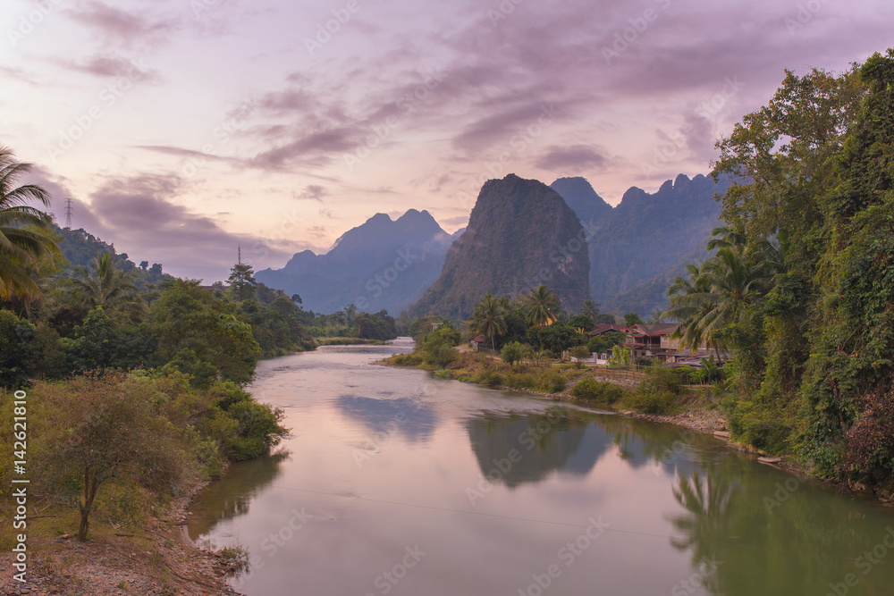 Beautiful sunrise over the Nam Song river near the Vang Vieng village, Laos