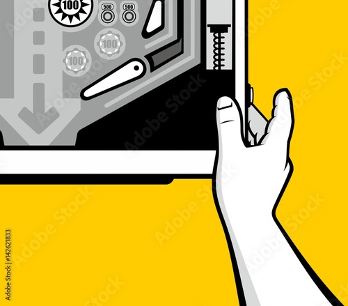 Man hand playing pinball game