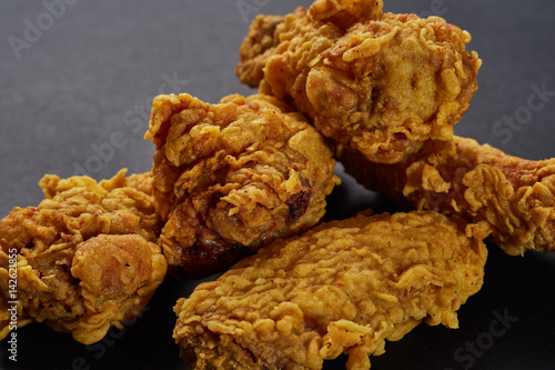 crispy kentucky fried chicken in beauty black background