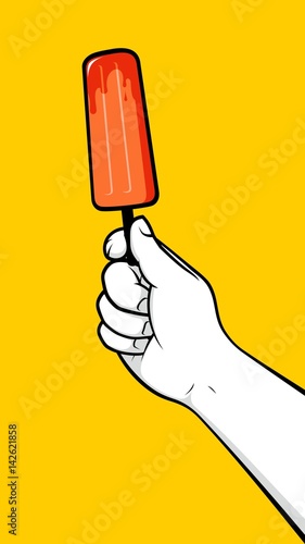 Hand holding Popsicle