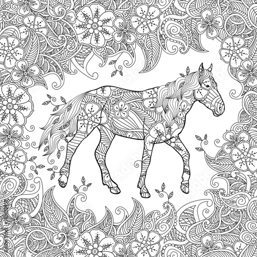 Coloring page in zentangle inspired style. Running horse on flowering meadow.