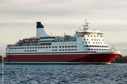Red cruise liner. Passenger ferry sailing from Riga to Stockholm © InfinitumProdux