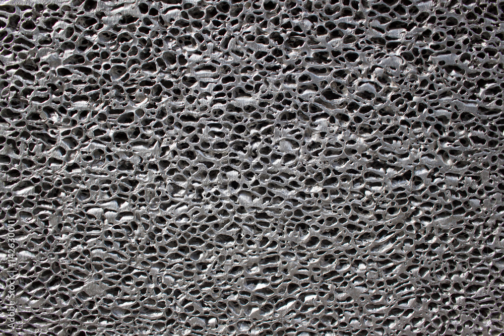 Porous surface. Metallic background Stock Photo Adobe Stock