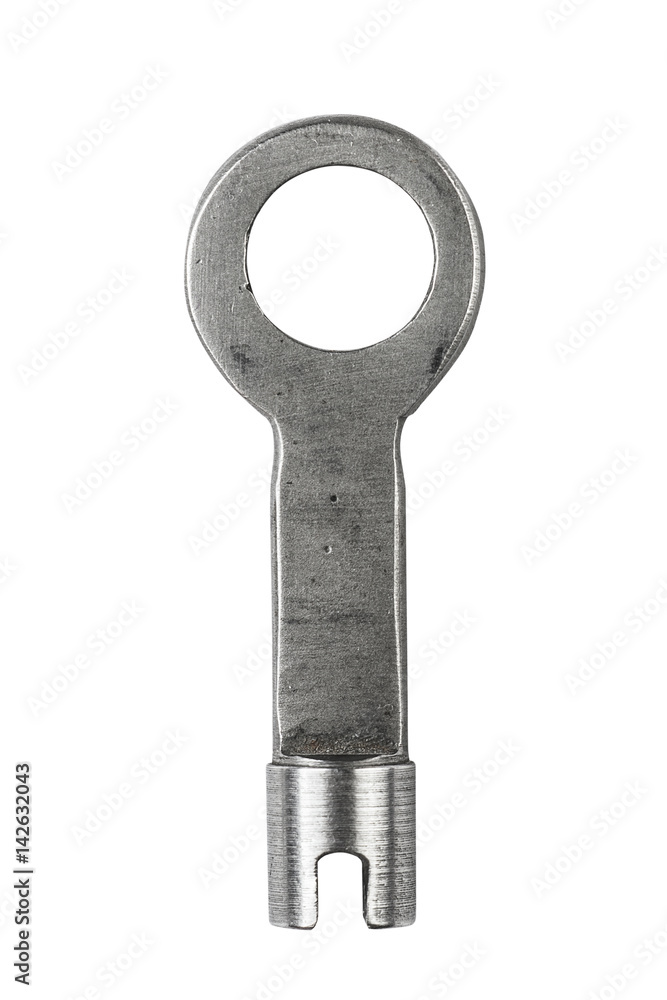 Old metallic key isolated on white background Old metallic key isolated on white background