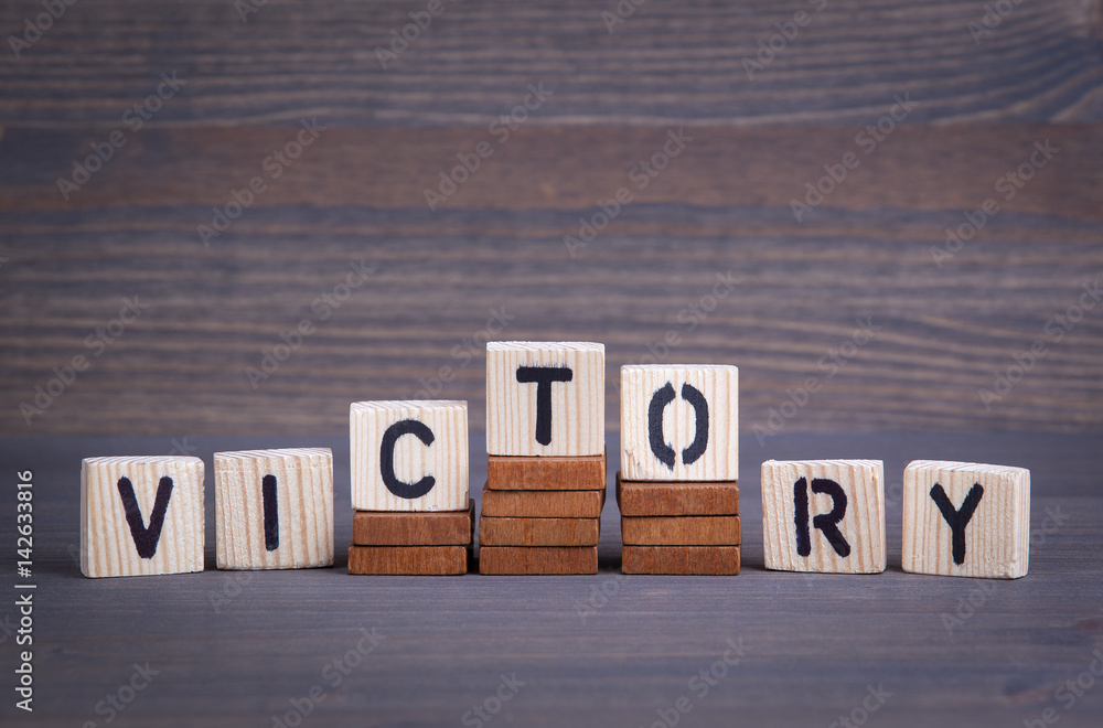 Victory from wooden letters. Abstract business and success background. Victory from wooden letters. Abstract business and success background.