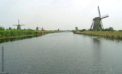 Historic Dutch Windmills at Kinderdijk , UNESCO World Heritage Site in Netherlands 