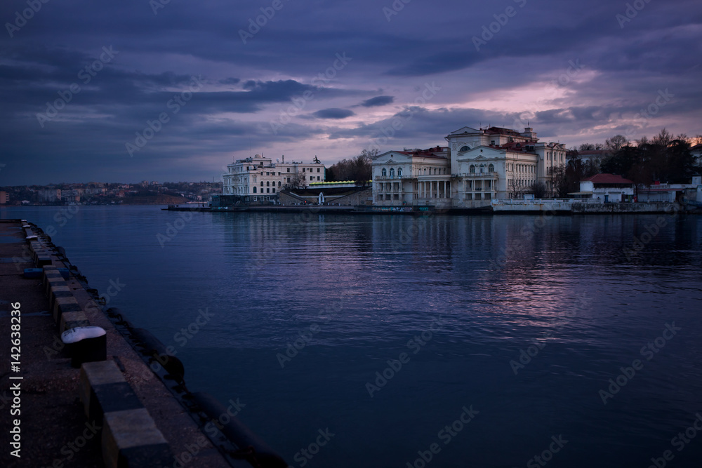 Fototapeta premium Sunrise in violet in the bay of Sevastopol, Crimea