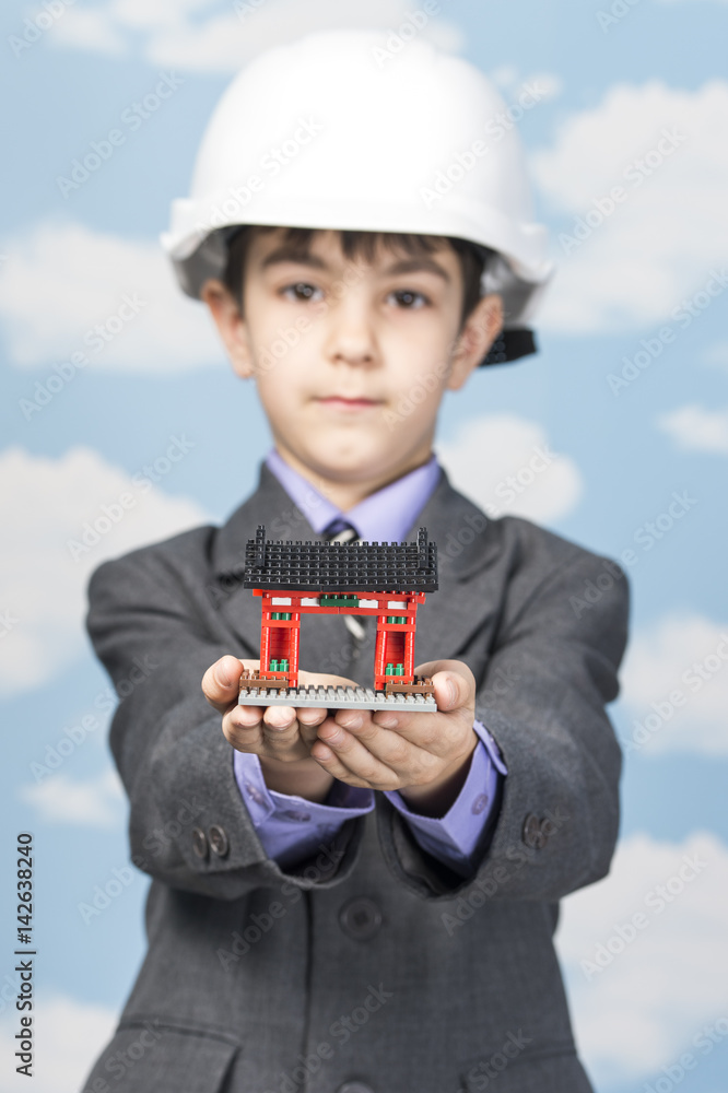 boy in helmet and jacket keeps built from the designer house boy in helmet and jacket keeps built from the designer house