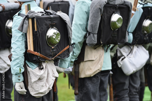 Soldiers in uniforms during military reenactment