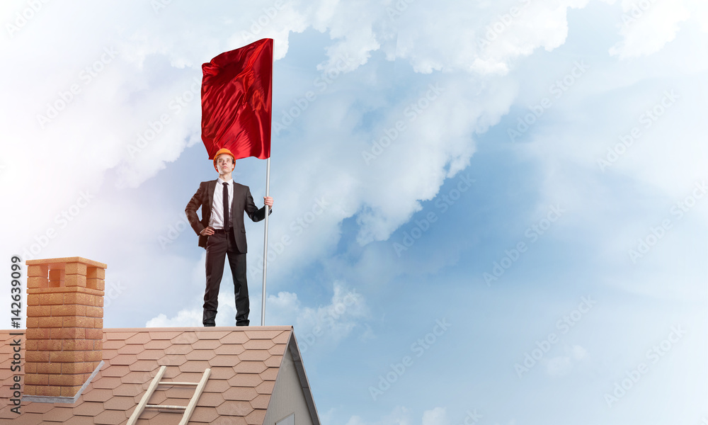 Young businessman with flag presenting concept of leadership. Mixed media Young businessman with flag presenting concept of leadership. Mixed media