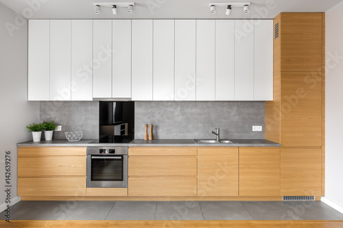 Kitchen with grey tiling